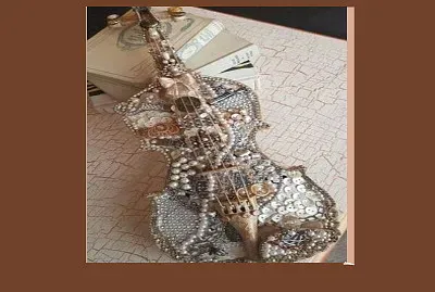 פאזל של guitare en boutons