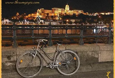 Bike along the Danube with Palace in the distance