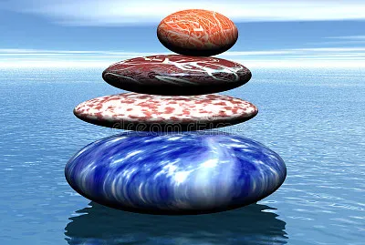 Stack of balanced stones on the sea.