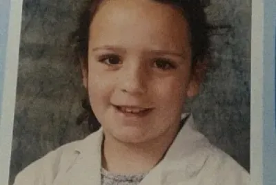 This is my school photo when I was in first grade.