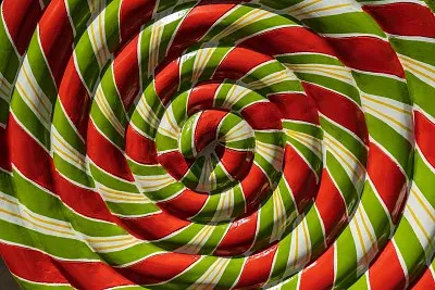 A large colourful ceramic lollipop