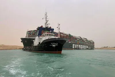 Massive cargo ship turns sideways, totally blocks