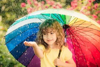 Little girl with umbrella