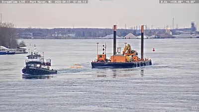 פאזל של tug  "Champion " pulling spud-barge barge Kokosing-1