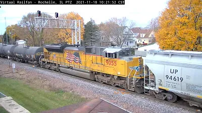 UP-9055  as mid-DPU with covered hopper UP-94619 at Rochelle, ILL