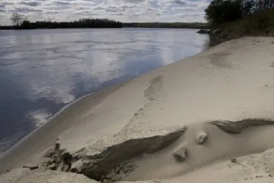 Sand dune at edge of Missouri River jigsaw puzzle