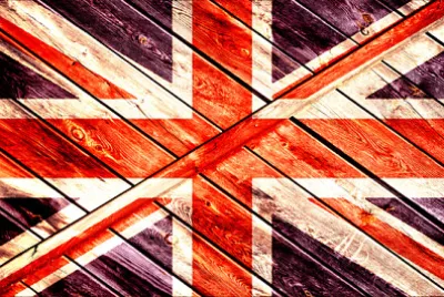 La bandiera britannica su uno sfondo di legno