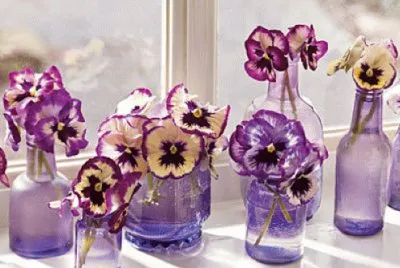 Pansies in Decorative Bottles