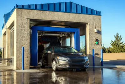 Car Exiting Wash Tunnel(grok)