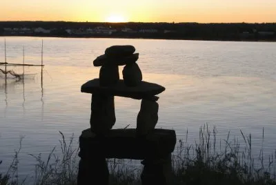 Inukshuk on the riverbank
