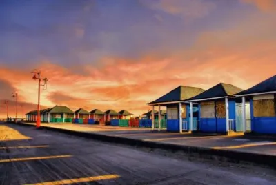 Beach huts - sunset over the boxes jigsaw puzzle
