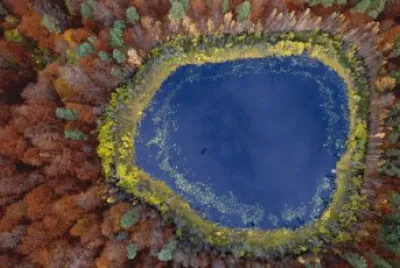aerial view of lake in autumn