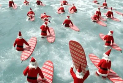 Surfing Santas Paddle Out