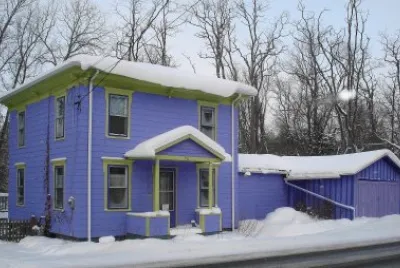 Snow Covered Purple House jigsaw puzzle