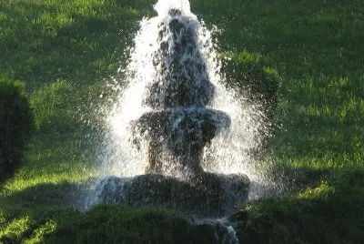 Water fountain in setting sun