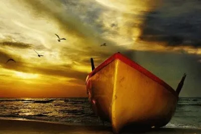 canoa e por do sol