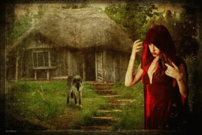 Mujer de rojo en casa del bosque con lobo