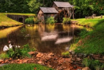 פאזל של Paisaje con rÃ­o y casa rÃºstica