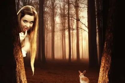 Chica en el bosque con conejo
