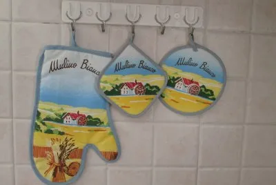Agarraderas de cocina de regalo con las compras