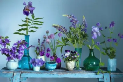 Flowers in Antique Glass Containers