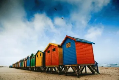Colorful surfer shacks at Muizenberg Beach, Cape T