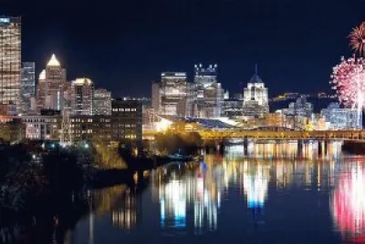 a view of Pittsburgh by night