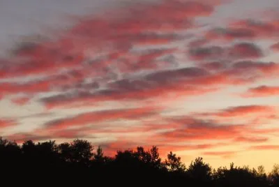 Dark pink clouds across the street