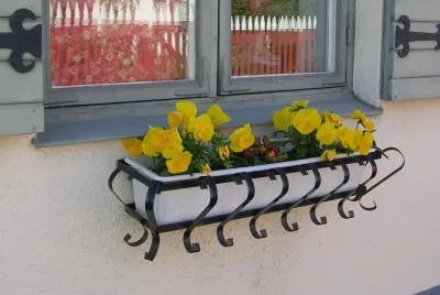 Yellow flower box and window, Gotland jigsaw puzzle