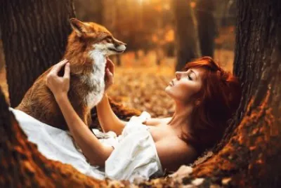 redhead girl with fox