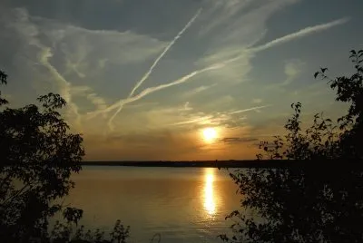 Criss-crossing contrails at sunset   L