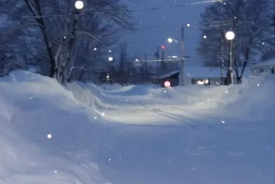 Our street in the evening snow