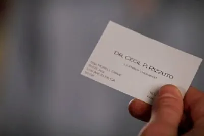 Doc Rizzuto 's card - Fractured
