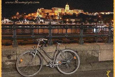 BIKE along the Danube with Palace in the distance