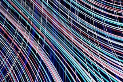 Pink, green, and blue rays flow