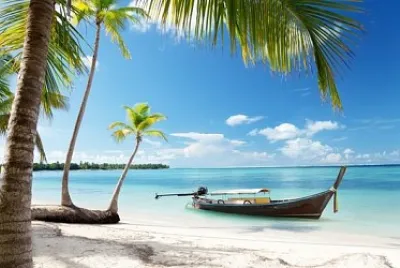 Boat in tropical waters jigsaw puzzle