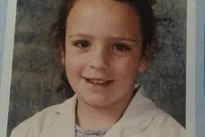 This is my school photo when I was in first grade.