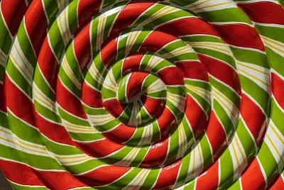 A large colourful ceramic lollipop