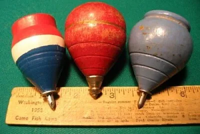 פאזל של large wooden spinning tops