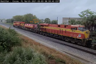 Florida East Coast #816, #303, #814 on a rany morn