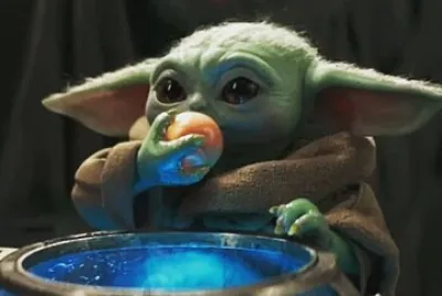 baby yoda eating eggs