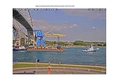 Crane being pulled down the St Clair River