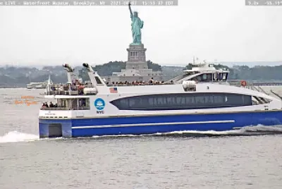 NYC Ferry in front of the Statue of Liberty Aug 20