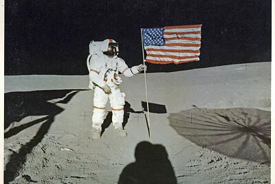 David Scott and flag on moon