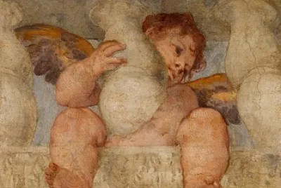 Putto alato