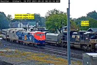 Amtrak engines 108 and 117 overtaking oil tanker train, Elkhart,IN/USA
