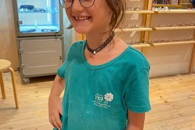 a beautiful girl with glasses