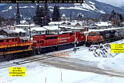 CN-2945, CN-3969 meets CP-7059   KCS-5012 at Revelstoke, in the Snow