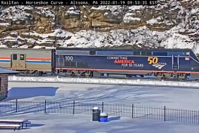 Amtrak engine #-100 leading train #-42 around Horseshoe Curve,PA/USA