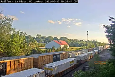2 trains passing LaPlata,MO/USA Amtrak depot
